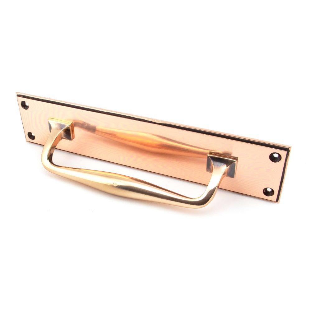 This is an image showing From The Anvil - Polished Bronze 300mm Art Deco Pull Handle on Backplate available from trade door handles, quick delivery and discounted prices