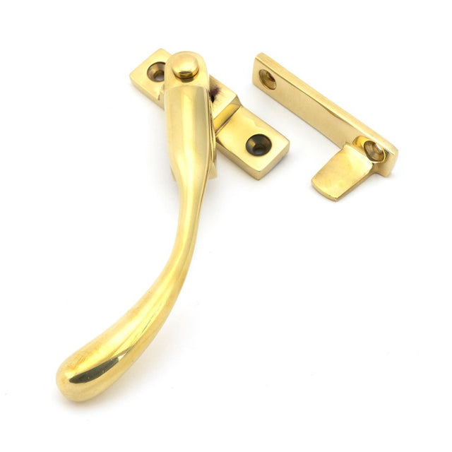 This is an image showing From The Anvil - Polished Brass Night-Vent Locking Peardrop Fastener - LH available from T.H Wiggans Architectural Ironmongery in Kendal, quick delivery and discounted prices