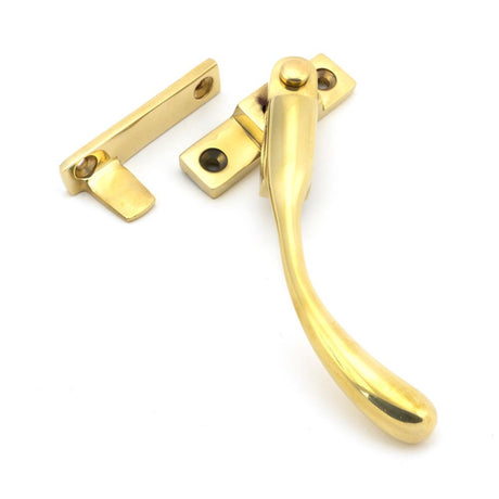 This is an image showing From The Anvil - Polished Brass Night-Vent Locking Peardrop Fastener - RH available from T.H Wiggans Architectural Ironmongery in Kendal, quick delivery and discounted prices