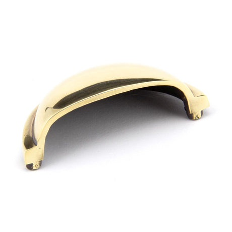 This is an image showing From The Anvil - Aged Brass Regency Concealed Drawer Pull available from trade door handles, quick delivery and discounted prices