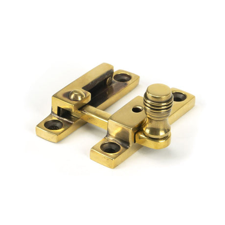 This is an image showing From The Anvil - Aged Brass Prestbury Quadrant Fastener - Narrow available from T.H Wiggans Architectural Ironmongery in Kendal, quick delivery and discounted prices