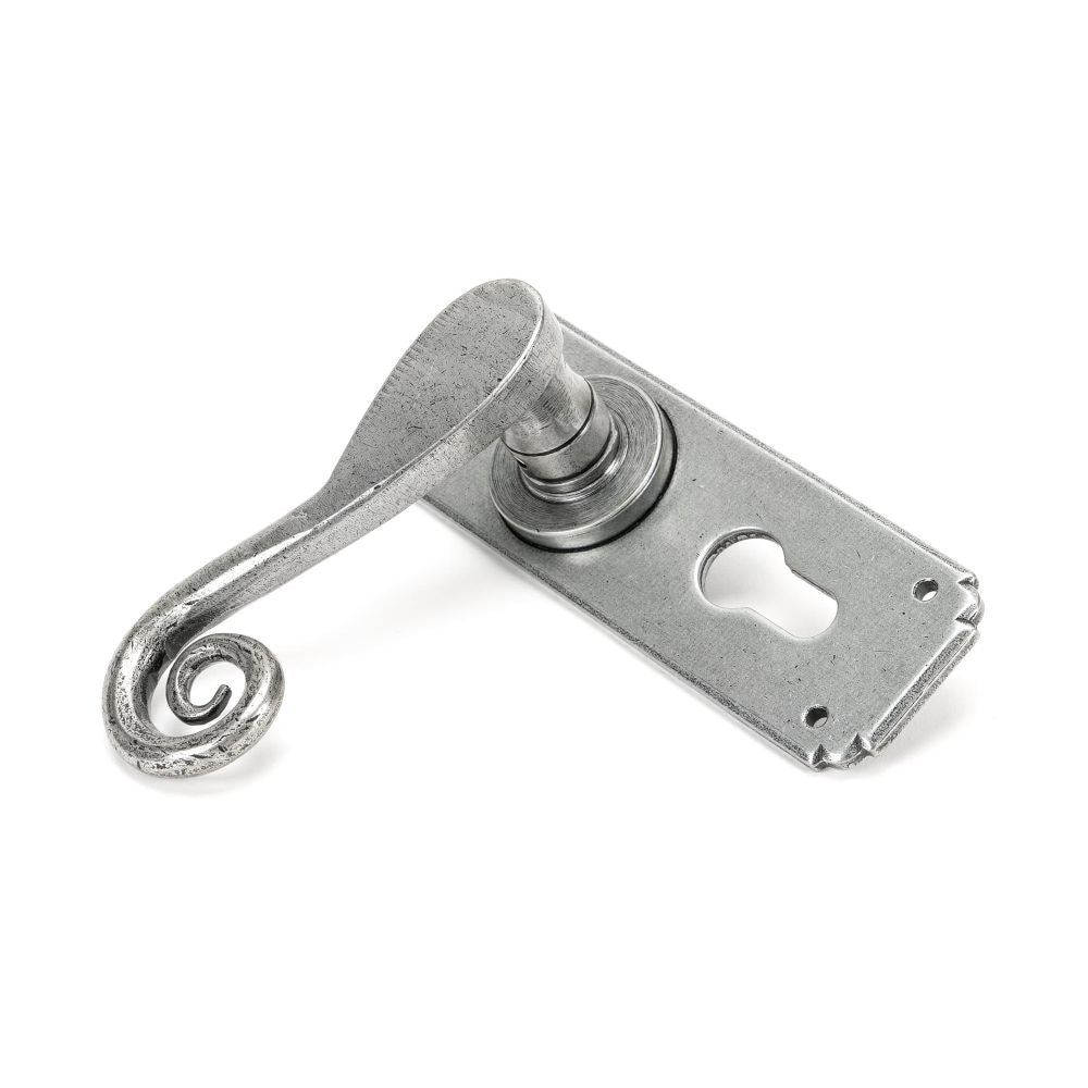 This is an image showing From The Anvil - Pewter Monkeytail Lever Euro Lock Set available from trade door handles, quick delivery and discounted prices