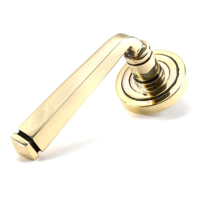 This is an image of From The Anvil - Aged Brass Avon Round Lever on Rose Set (Art Deco) available to order from T.H Wiggans Architectural Ironmongery in Kendal, quick delivery and discounted prices.