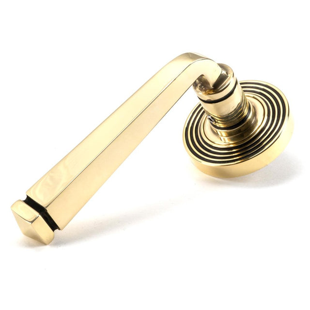 This is an image of From The Anvil - Aged Brass Avon Round Lever on Rose Set (Beehive) available to order from T.H Wiggans Architectural Ironmongery in Kendal, quick delivery and discounted prices.