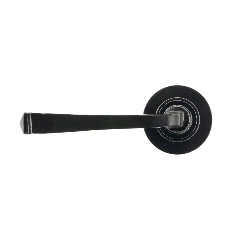 This is an image showing From The Anvil - Black Avon Round Lever on Rose Set (Plain) available from trade door handles, quick delivery and discounted prices