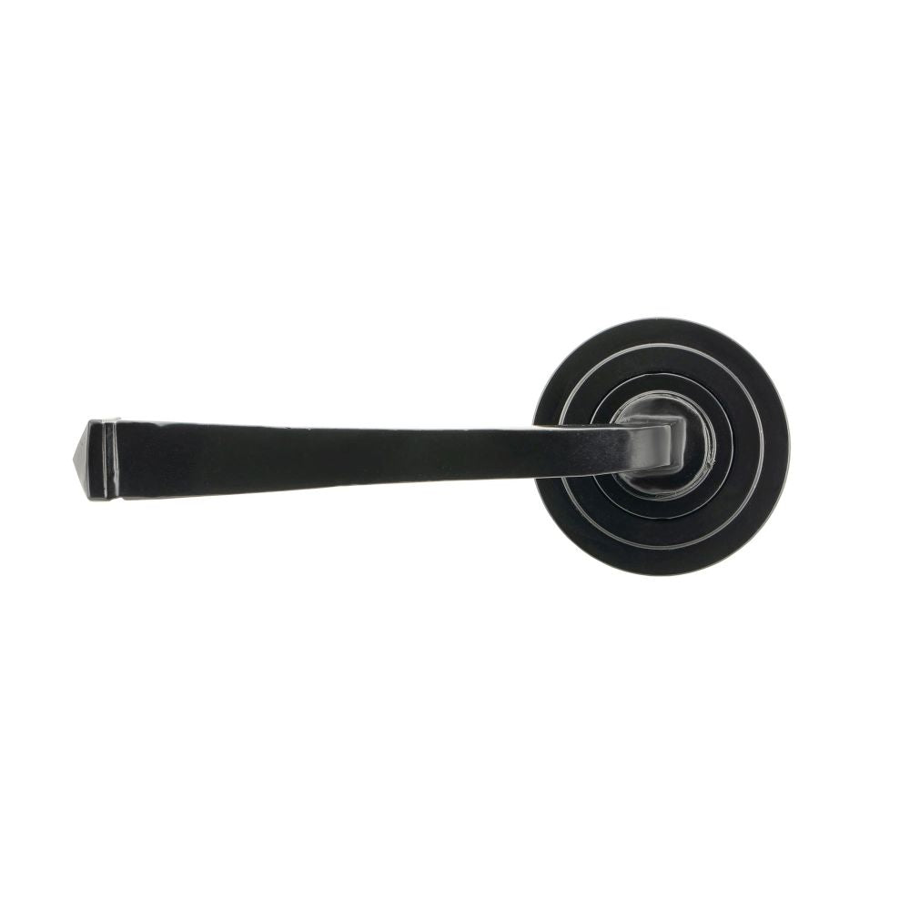 This is an image showing From The Anvil - Black Avon Round Lever on Rose Set (Art Deco) available from trade door handles, quick delivery and discounted prices