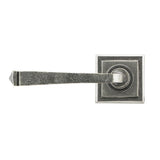 This is an image showing From The Anvil - Pewter Avon Round Lever on Rose Set (Square) available from trade door handles, quick delivery and discounted prices