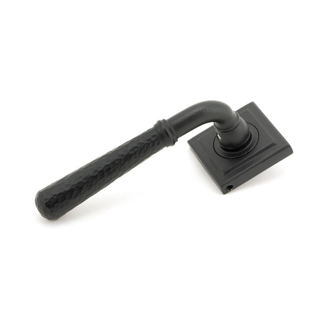 This is an image of From The Anvil - Matt Black Hammered Newbury Lever on Rose Set (Square) available to order from T.H Wiggans Architectural Ironmongery in Kendal, quick delivery and discounted prices.