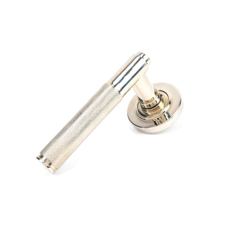 This is an image of From The Anvil - Polished Nickel Brompton Lever on Rose Set (Plain) available to order from T.H Wiggans Architectural Ironmongery in Kendal, quick delivery and discounted prices.