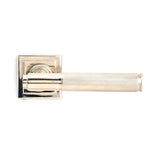 This is an image showing From The Anvil - Polished Nickel Brompton Lever on Rose Set (Square) available from trade door handles, quick delivery and discounted prices