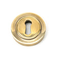 This is an image of From The Anvil - Aged Brass Round Escutcheon (Plain) available to order from T.H Wiggans Architectural Ironmongery in Kendal, quick delivery and discounted prices.