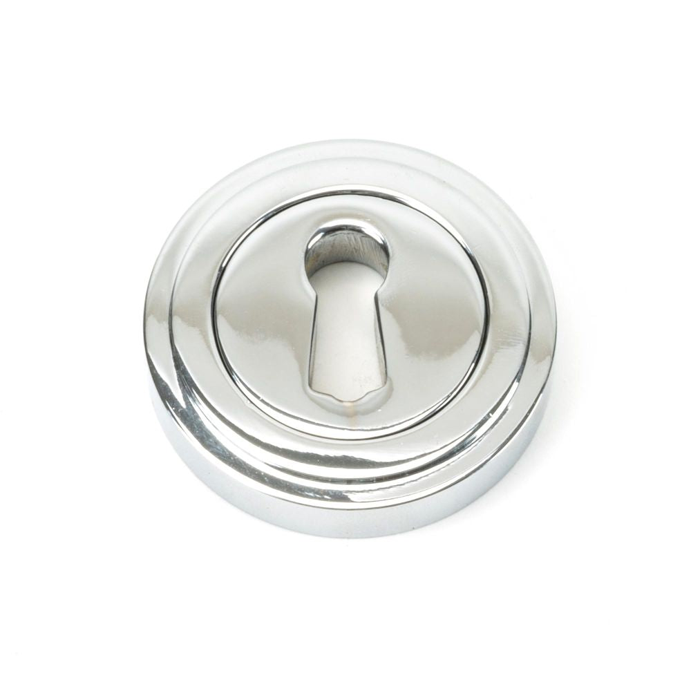 This is an image of From The Anvil - Polished Chrome Round Escutcheon (Art Deco) available to order from T.H Wiggans Architectural Ironmongery in Kendal, quick delivery and discounted prices.