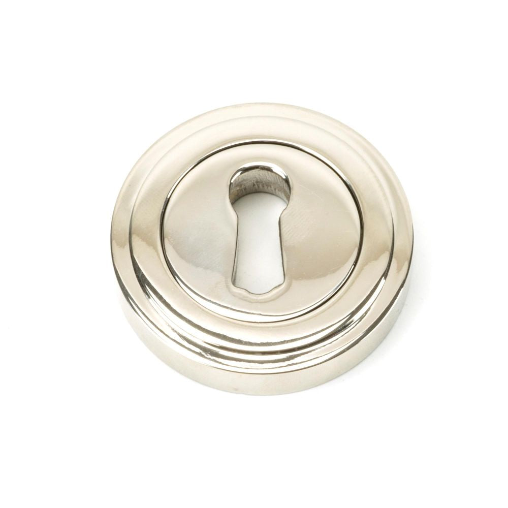 This is an image of From The Anvil - Polished Nickel Round Escutcheon (Art Deco) available to order from T.H Wiggans Architectural Ironmongery in Kendal, quick delivery and discounted prices.