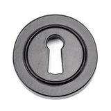 This is an image of From The Anvil - Black Round Escutcheon (Plain) available to order from T.H Wiggans Architectural Ironmongery in Kendal, quick delivery and discounted prices.