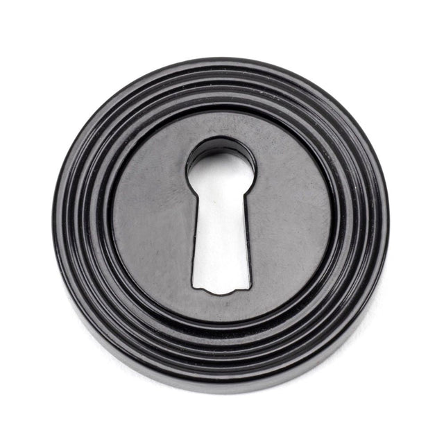 This is an image of From The Anvil - Black Round Escutcheon (Beehive) available to order from T.H Wiggans Architectural Ironmongery in Kendal, quick delivery and discounted prices.