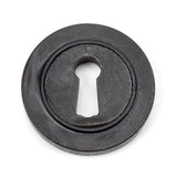 This is an image of From The Anvil - External Beeswax Round Escutcheon (Plain) available to order from T.H Wiggans Architectural Ironmongery in Kendal, quick delivery and discounted prices.