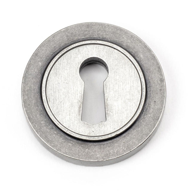 This is an image of From The Anvil - Pewter Round Escutcheon (Plain) available to order from T.H Wiggans Architectural Ironmongery in Kendal, quick delivery and discounted prices.