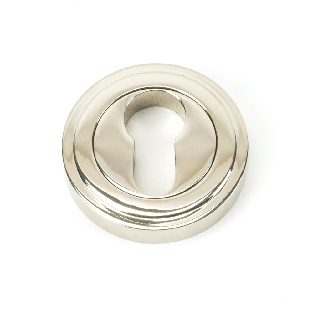 This is an image of From The Anvil - Polished Nickel Round Euro Escutcheon (Art Deco) available to order from T.H Wiggans Architectural Ironmongery in Kendal, quick delivery and discounted prices.