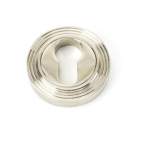 This is an image of From The Anvil - Polished Nickel Round Euro Escutcheon (Beehive) available to order from T.H Wiggans Architectural Ironmongery in Kendal, quick delivery and discounted prices.