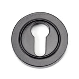 This is an image of From The Anvil - Black Round Euro Escutcheon (Plain) available to order from T.H Wiggans Architectural Ironmongery in Kendal, quick delivery and discounted prices.