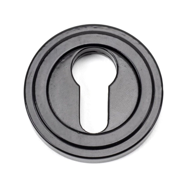 This is an image of From The Anvil - Black Round Euro Escutcheon (Art Deco) available to order from T.H Wiggans Architectural Ironmongery in Kendal, quick delivery and discounted prices.