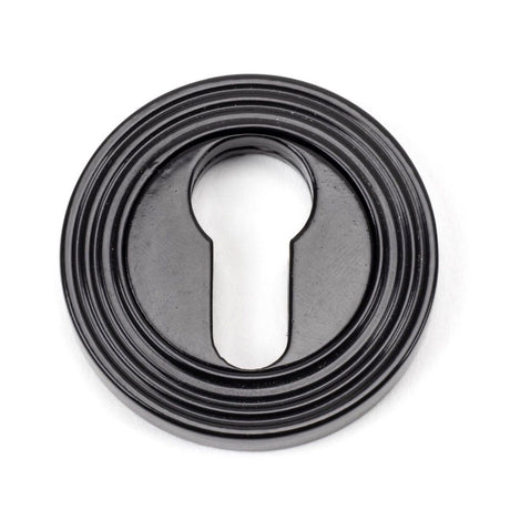 This is an image of From The Anvil - Black Round Euro Escutcheon (Beehive) available to order from T.H Wiggans Architectural Ironmongery in Kendal, quick delivery and discounted prices.