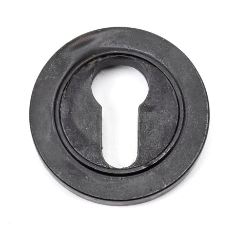 This is an image of From The Anvil - External Beeswax Round Euro Escutcheon (Plain) available to order from T.H Wiggans Architectural Ironmongery in Kendal, quick delivery and discounted prices.