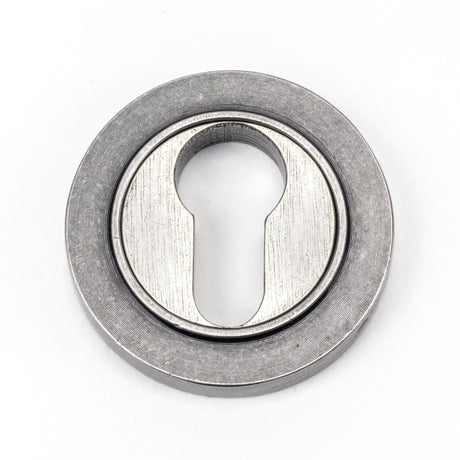 This is an image of From The Anvil - Pewter Round Euro Escutcheon (Plain) available to order from T.H Wiggans Architectural Ironmongery in Kendal, quick delivery and discounted prices.