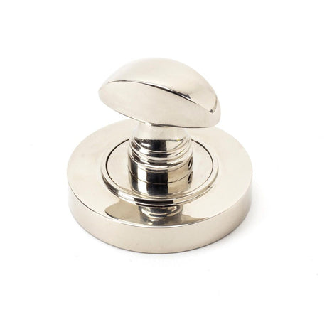 This is an image showing From The Anvil - Polished Nickel Round Thumbturn Set (Plain) available from trade door handles, quick delivery and discounted prices