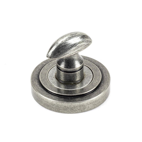 This is an image showing From The Anvil - Pewter Round Thumbturn Set (Art Deco) available from trade door handles, quick delivery and discounted prices