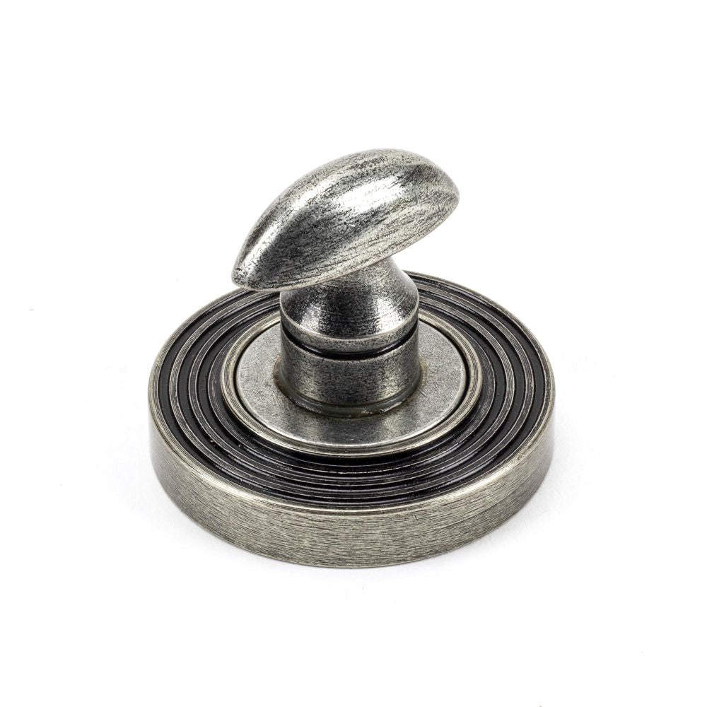 This is an image showing From The Anvil - Pewter Round Thumbturn Set (Beehive) available from trade door handles, quick delivery and discounted prices