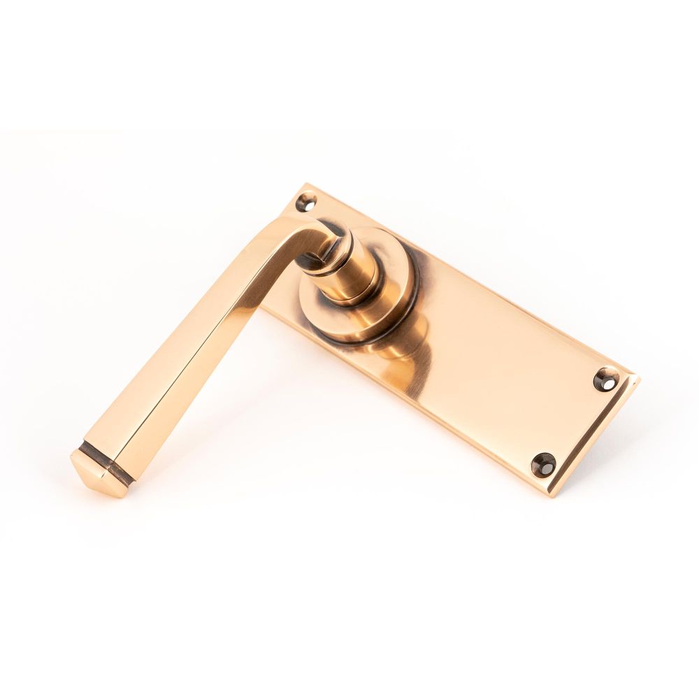 This is an image showing From The Anvil - Polished Bronze Avon Lever Latch Set available from trade door handles, quick delivery and discounted prices