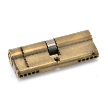 This is an image showing From The Anvil - Aged Brass 40/40 5pin Euro Cylinder available from T.H Wiggans Architectural Ironmongery in Kendal, quick delivery and discounted prices