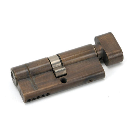 This is an image showing From The Anvil - Aged Brass 35/35 5pin Euro Cylinder/Thumbturn available from T.H Wiggans Architectural Ironmongery in Kendal, quick delivery and discounted prices