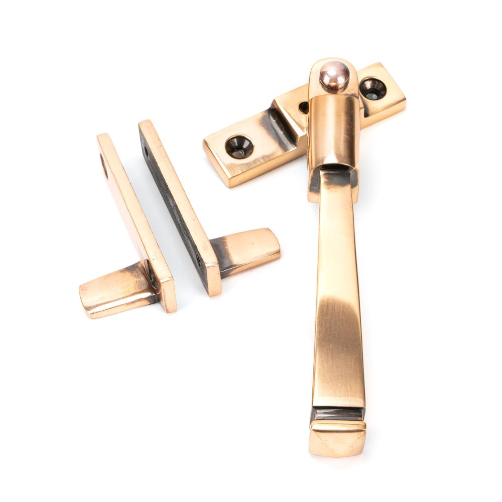 This is an image showing From The Anvil - Polished Bronze Night-Vent Locking Avon Fastener available from T.H Wiggans Architectural Ironmongery in Kendal, quick delivery and discounted prices