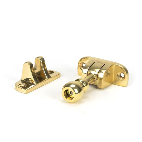 This is an image showing From The Anvil - Polished Brass Mushroom Brighton Fastener (Radiused) available from T.H Wiggans Architectural Ironmongery in Kendal, quick delivery and discounted prices