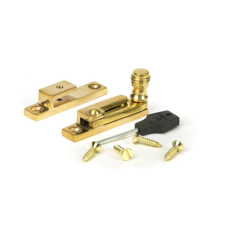 This is an image showing From The Anvil - Polished Brass Prestbury Quadrant Fastener - Narrow available from T.H Wiggans Architectural Ironmongery in Kendal, quick delivery and discounted prices