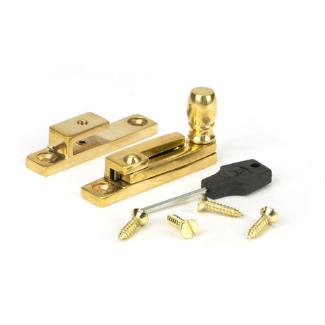 This is an image showing From The Anvil - Polished Brass Mushroom Quadrant Fastener - Narrow available from T.H Wiggans Architectural Ironmongery in Kendal, quick delivery and discounted prices