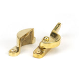 This is an image showing From The Anvil - Polished Brass Fitch Fastener available from T.H Wiggans Architectural Ironmongery in Kendal, quick delivery and discounted prices