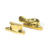 This is an image showing From The Anvil - Polished Brass Fitch Fastener available from T.H Wiggans Architectural Ironmongery in Kendal, quick delivery and discounted prices