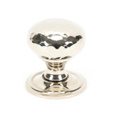 This is an image showing From The Anvil - Polished Nickel Hammered Mushroom Cabinet Knob 32mm available from T.H Wiggans Architectural Ironmongery in Kendal, quick delivery and discounted prices