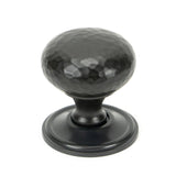 This is an image showing From The Anvil - Aged Bronze Hammered Mushroom Cabinet Knob 38mm available from T.H Wiggans Architectural Ironmongery in Kendal, quick delivery and discounted prices