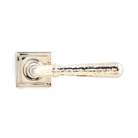 This is an image showing From The Anvil - Pol. Nickel Hammered Newbury Lever on Rose Set (Square) available from trade door handles, quick delivery and discounted prices