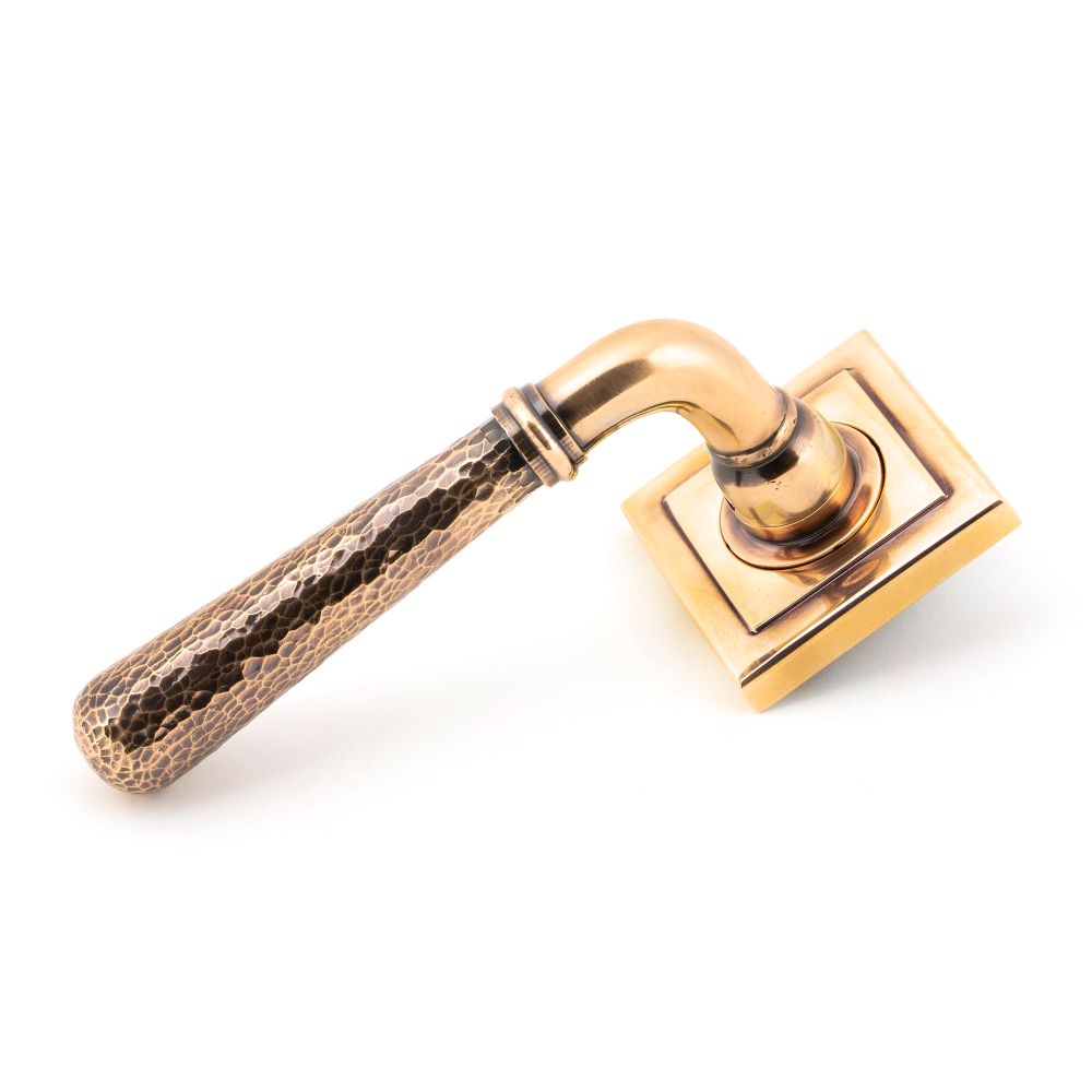 This is an image of From The Anvil - Polished Bronze Hammered Newbury Lever on Rose Set (Square) available to order from T.H Wiggans Architectural Ironmongery in Kendal, quick delivery and discounted prices.