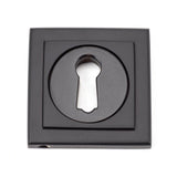 This is an image of From The Anvil - Aged Bronze Round Escutcheon (Square) available to order from T.H Wiggans Architectural Ironmongery in Kendal, quick delivery and discounted prices.