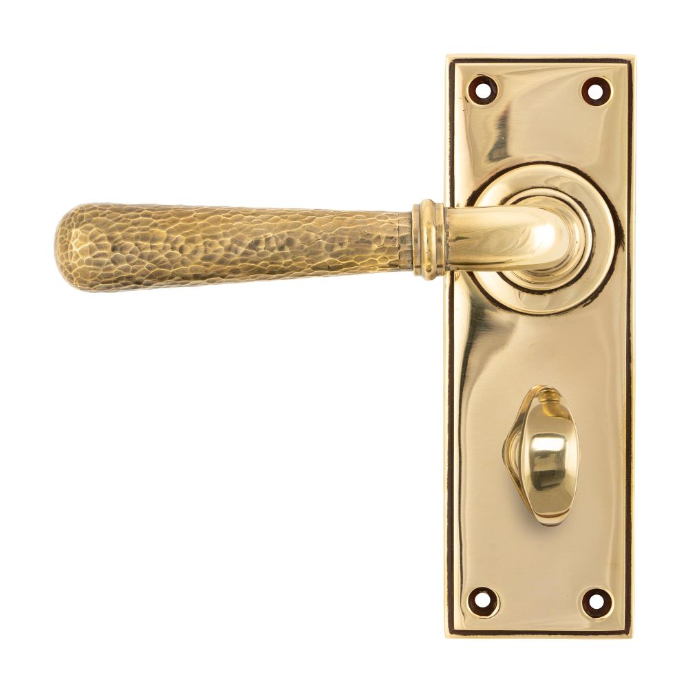 This is an image of From The Anvil - Aged Brass Hammered Newbury Lever Bathroom Set available to order from T.H Wiggans Architectural Ironmongery in Kendal, quick delivery and discounted prices.