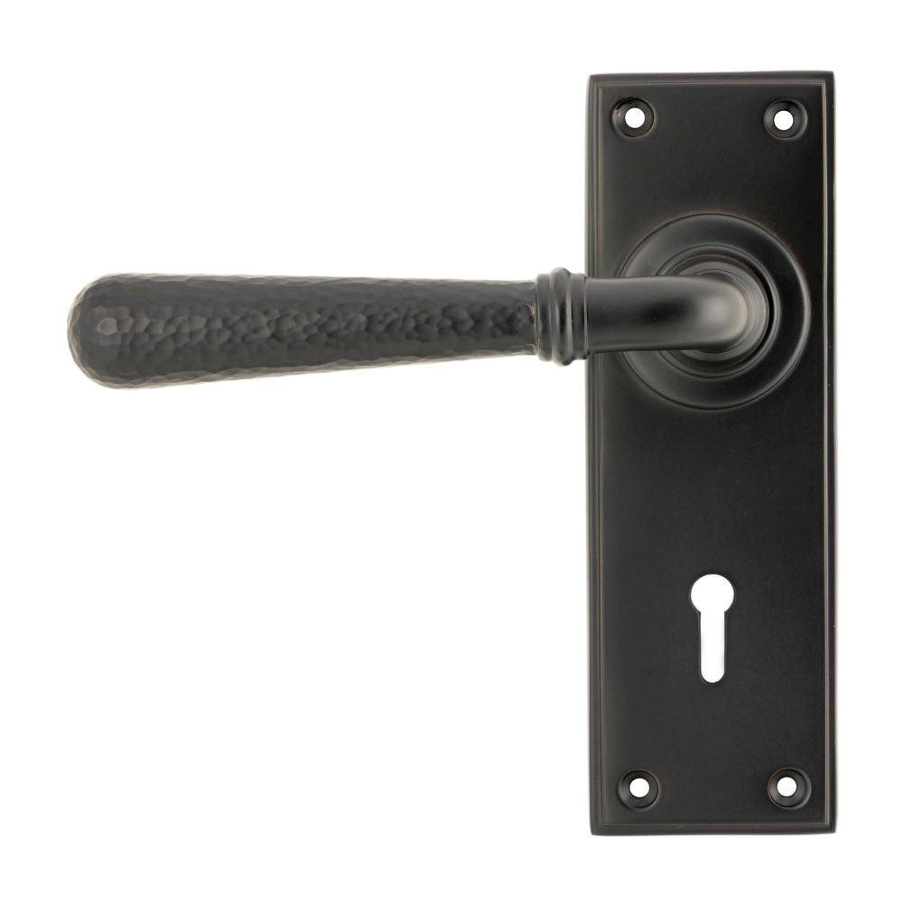 This is an image of From The Anvil - Aged Bronze Hammered Newbury Lever Lock Set available to order from T.H Wiggans Architectural Ironmongery in Kendal, quick delivery and discounted prices.