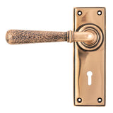 This is an image of From The Anvil - Polished Bronze Hammered Newbury Lever Lock Set available to order from T.H Wiggans Architectural Ironmongery in Kendal, quick delivery and discounted prices.