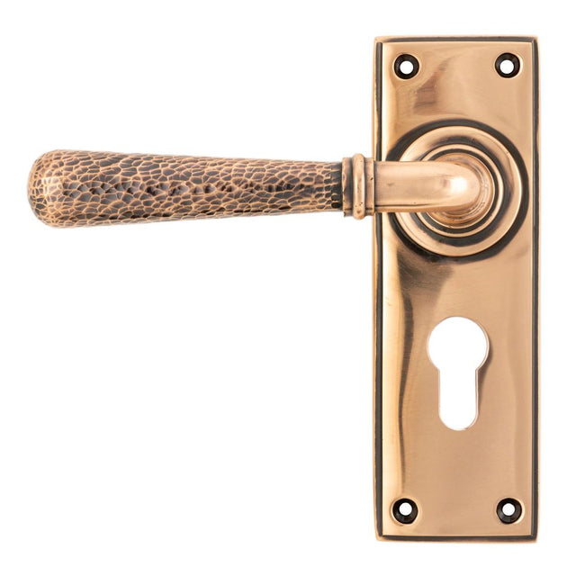 This is an image of From The Anvil - Polished Bronze Hammered Newbury Lever Euro Lock Set available to order from T.H Wiggans Architectural Ironmongery in Kendal, quick delivery and discounted prices.