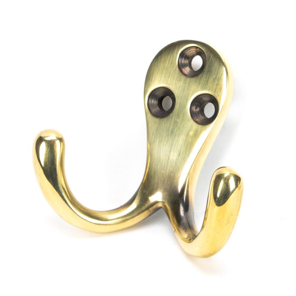 This is an image showing From The Anvil - Aged Brass Celtic Double Robe Hook available from T.H Wiggans Architectural Ironmongery in Kendal, quick delivery and discounted prices